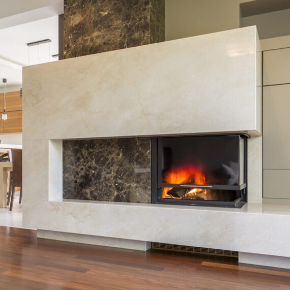 Fireplace built with white marble